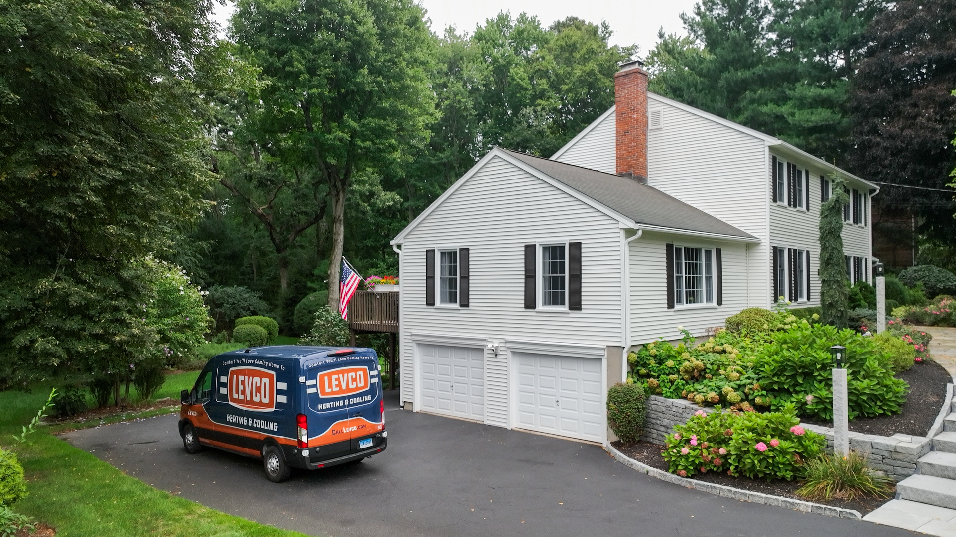 Levco service van parked beside a Connecticut home