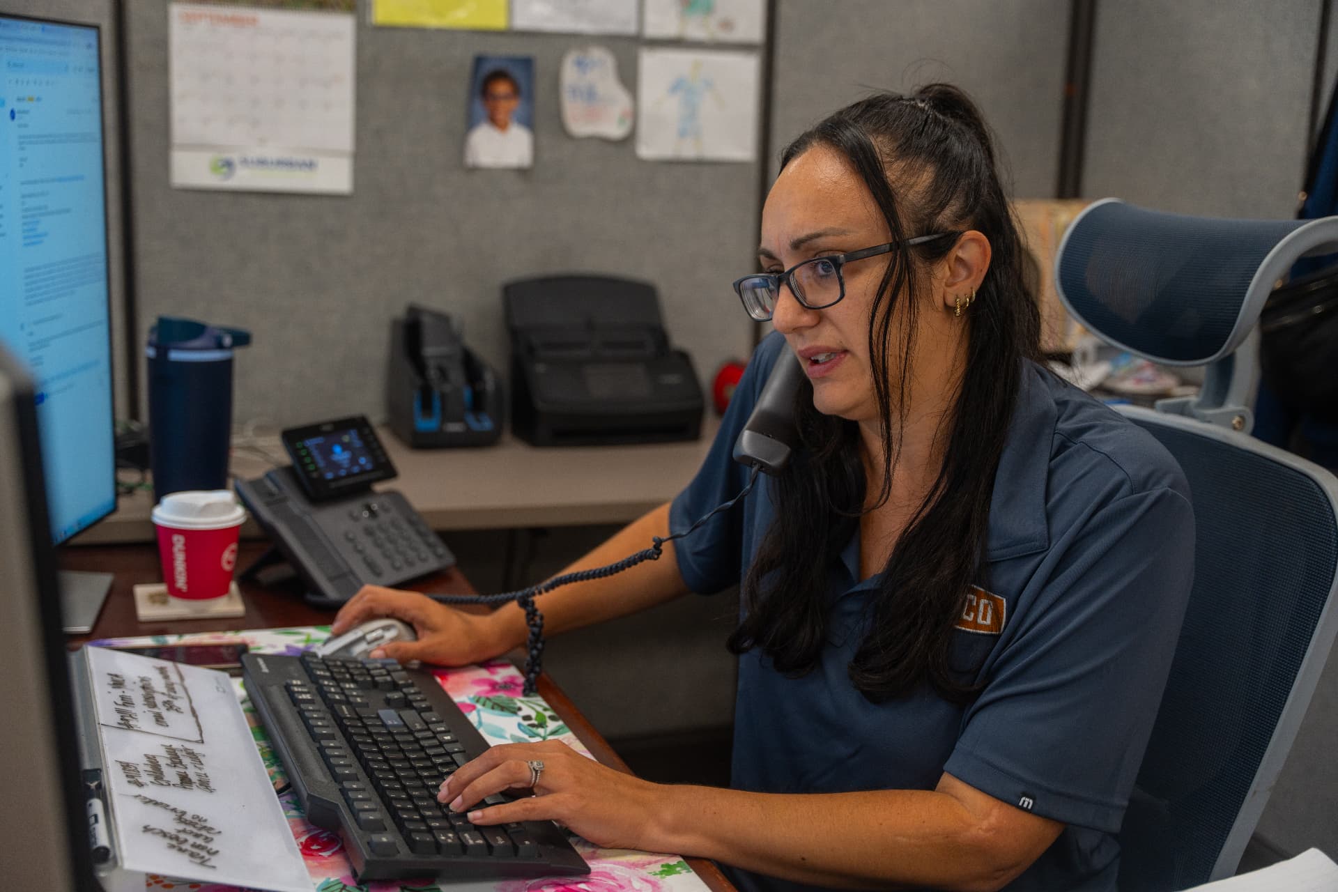 Levco team member at the Connecticut office taking a homeowner's call about a propane project